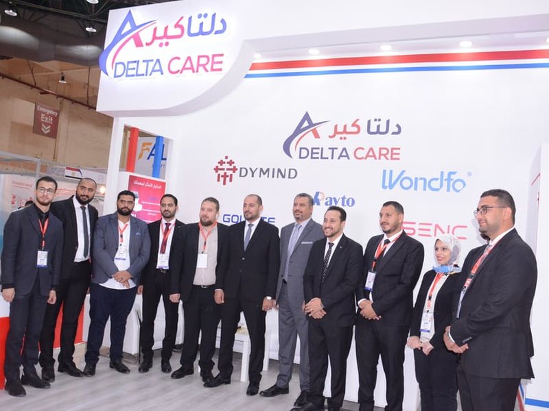 An exhibitor team welcoming visitors at EgyMedica